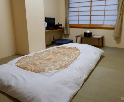 Kawaguchiko Station Inn, chambre à la japonaise de l'auberge avec futon 1 personne