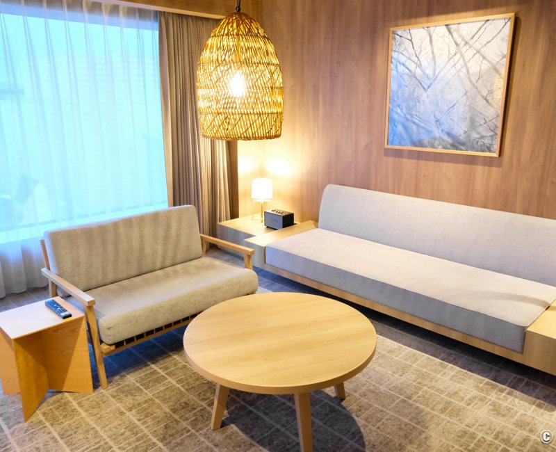 The Royal Park Canvas Fukuoka Nakasu (Kyushu), espace salon de la chambre Premium Twin Riverside The Royal Park Canvas Fukuoka Nakasu (Kyushu), espace salon de la chambre Premium Twin Riverside