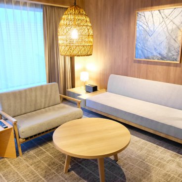 The Royal Park Canvas Fukuoka Nakasu (Kyushu), espace salon de la chambre Premium Twin Riverside